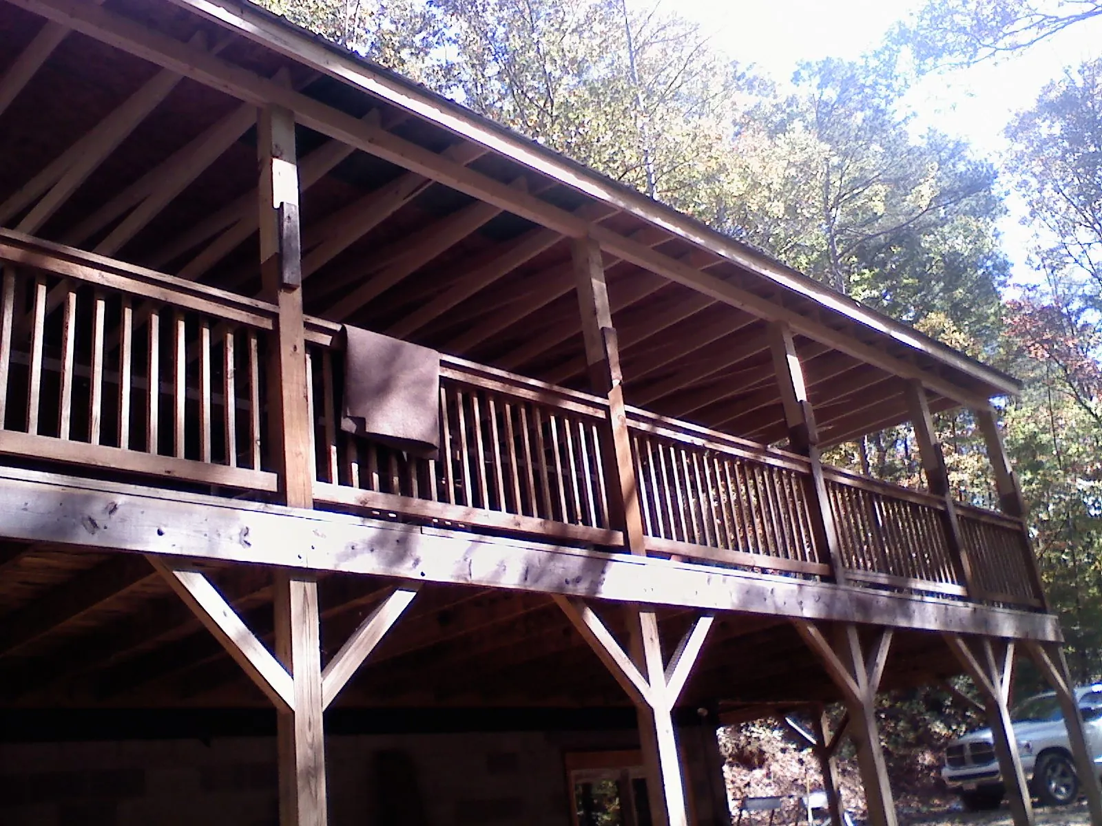 Timber framing under a new elevated porch and deck — Roof Leak Repair in Mc Intire by Roofing Brothers